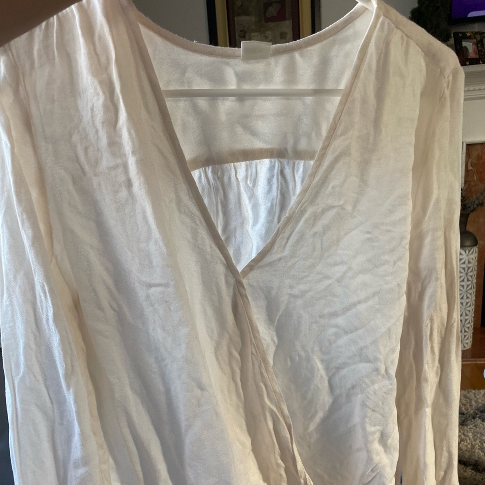 Cream bell sleeve wrap front blouse